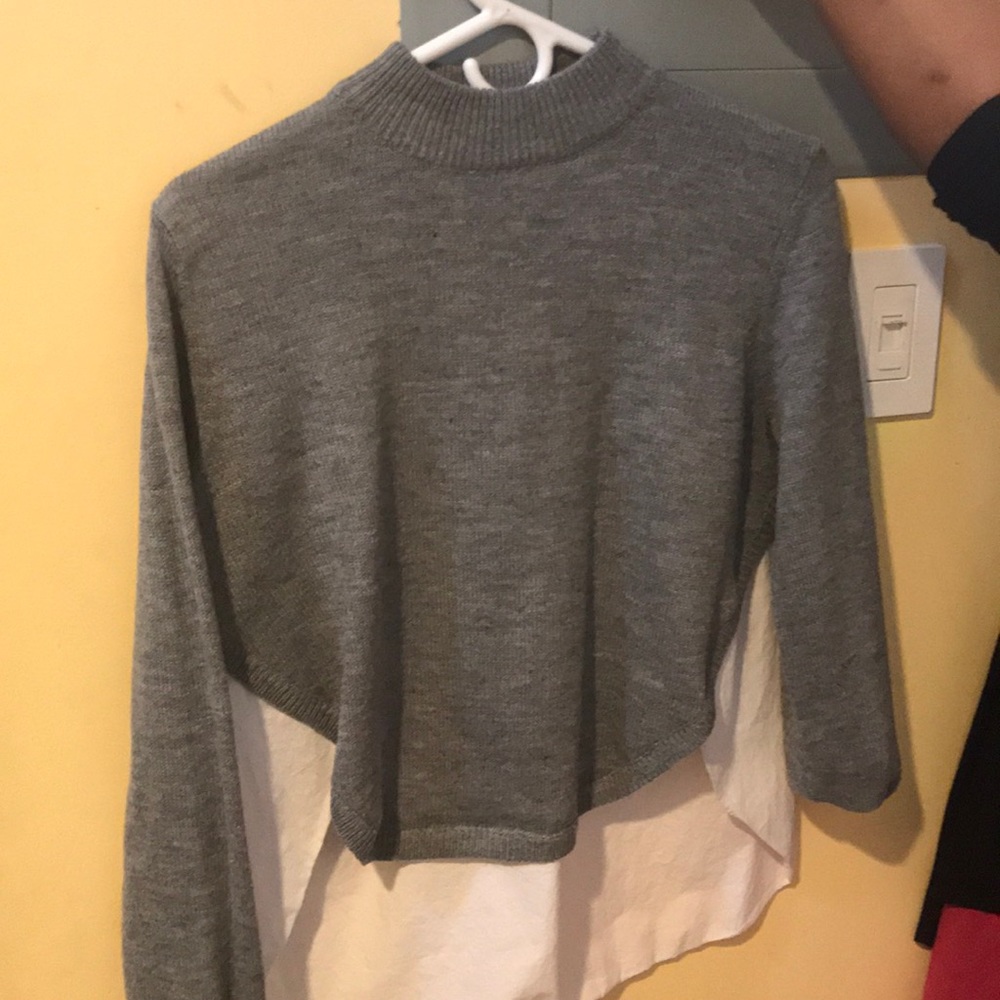 Cotton white sweater, knitted with a white shirt.